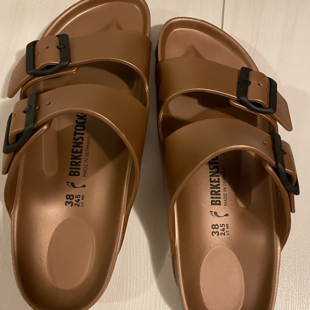 Like new Bronze Birkenstock foam sandals